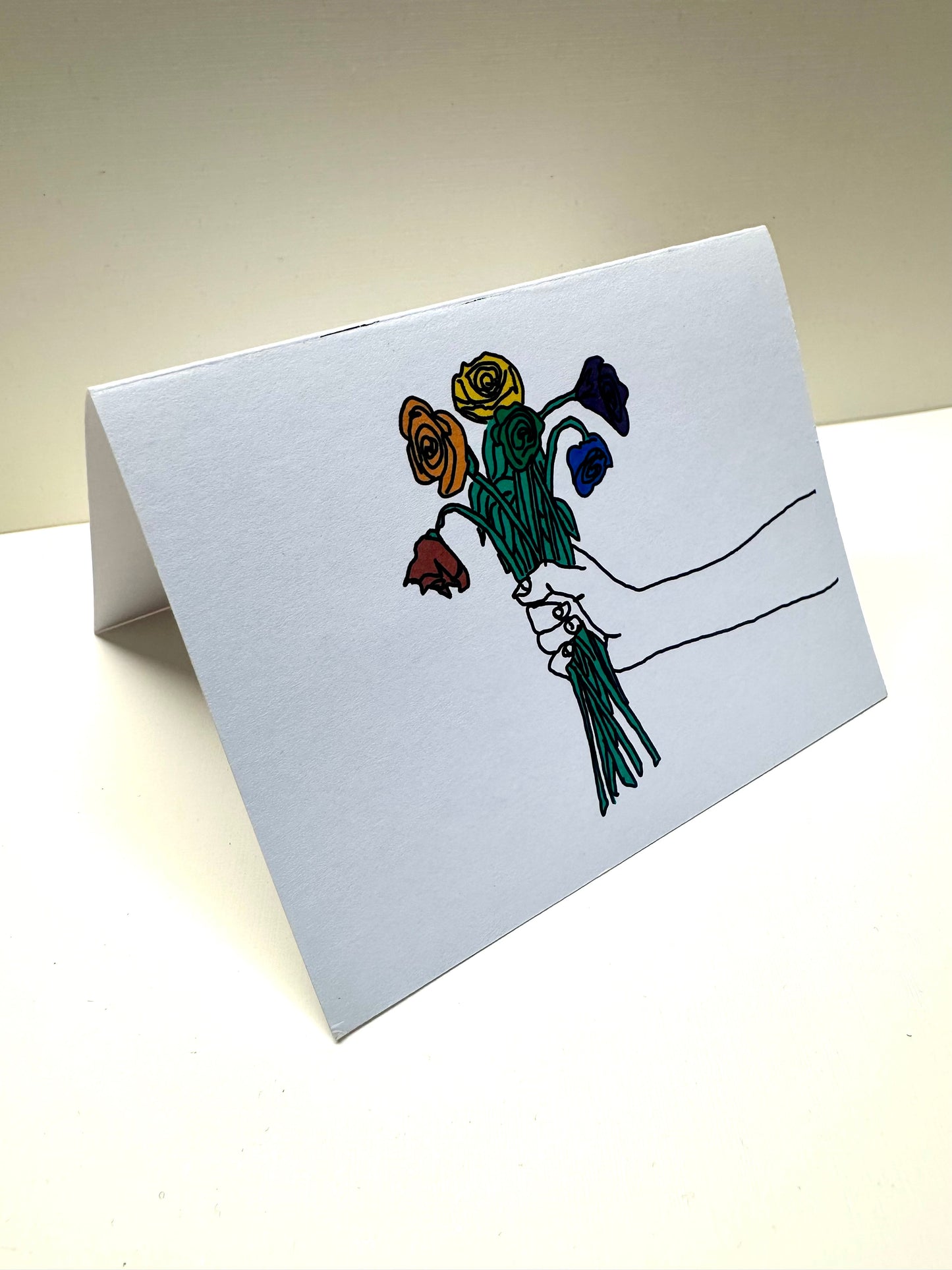 Folded front view of 'Wilted Flowers Card' on white background.