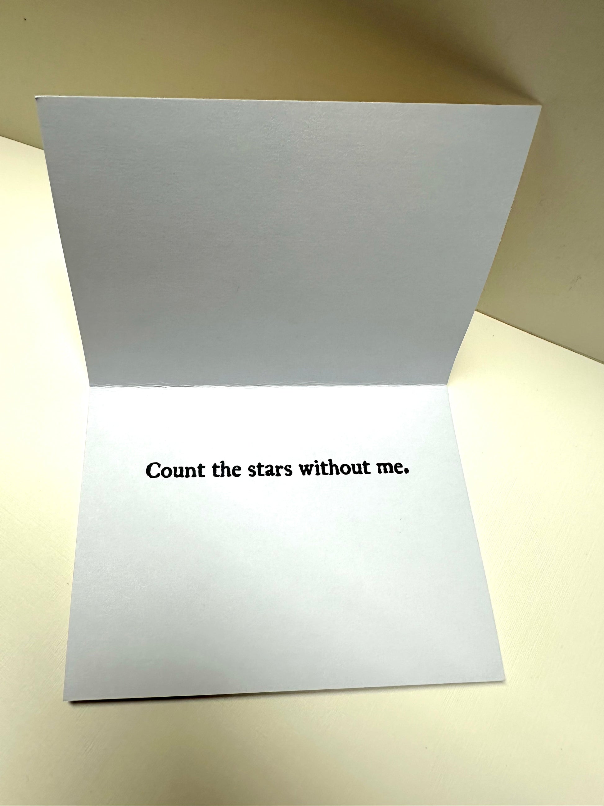 Inside of 'Peacock display card' that simply says: Count the stars without me.