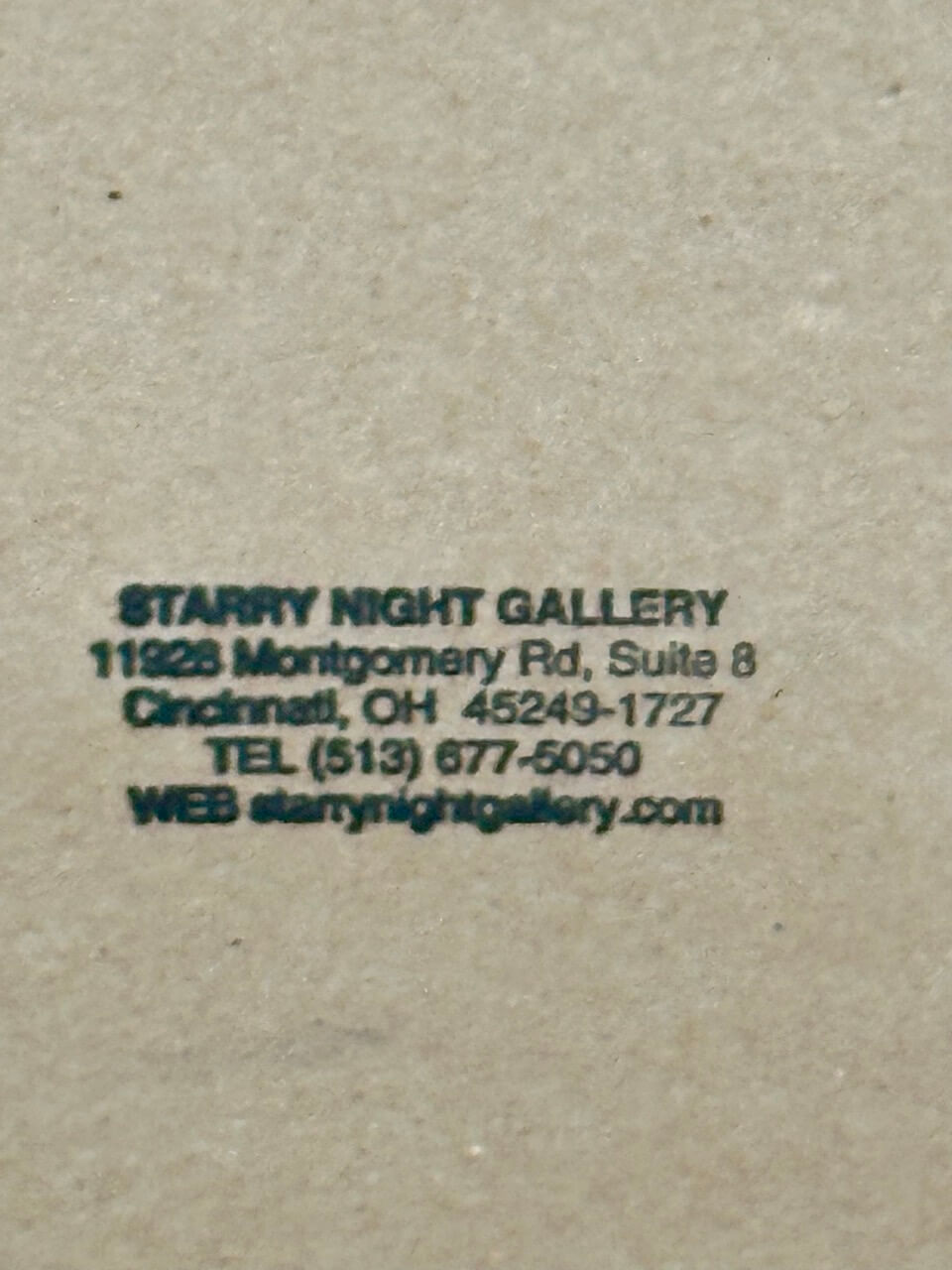 Text on a beige background for Starry Night Gallery contact information