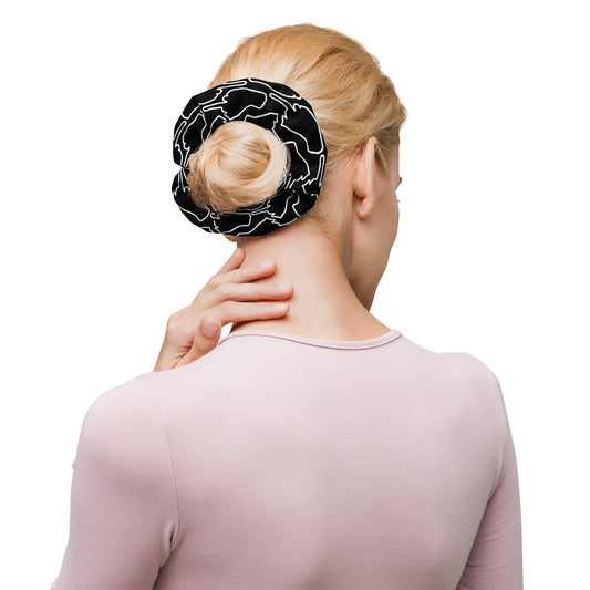 Back view of stylish Fox & Thistle Studio's One Finger Wave scrunchie in black with fine white gesture motif — soft, stretchy, and laced with subtle attitude.