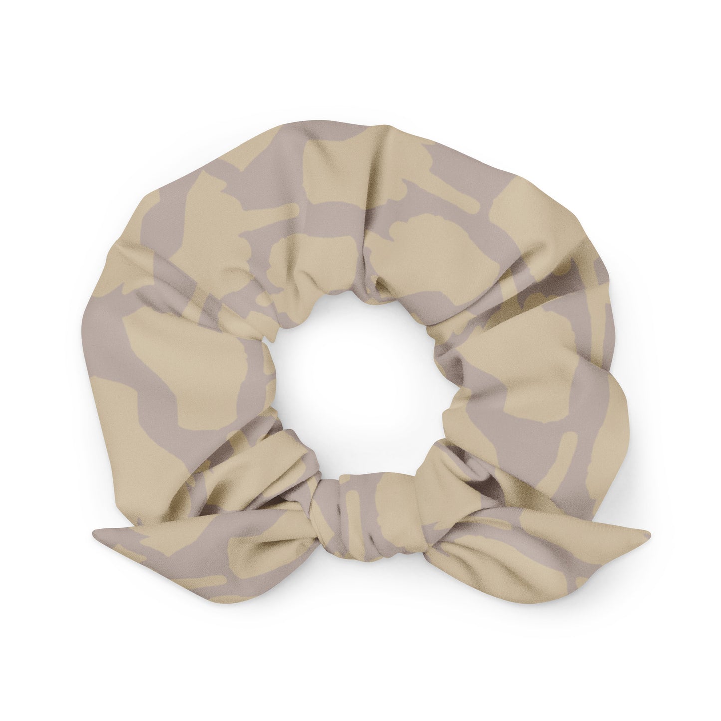 Neutral-toned One Finger Wave scrunchie in taupe — understated yet expressive design made from leftover materials.