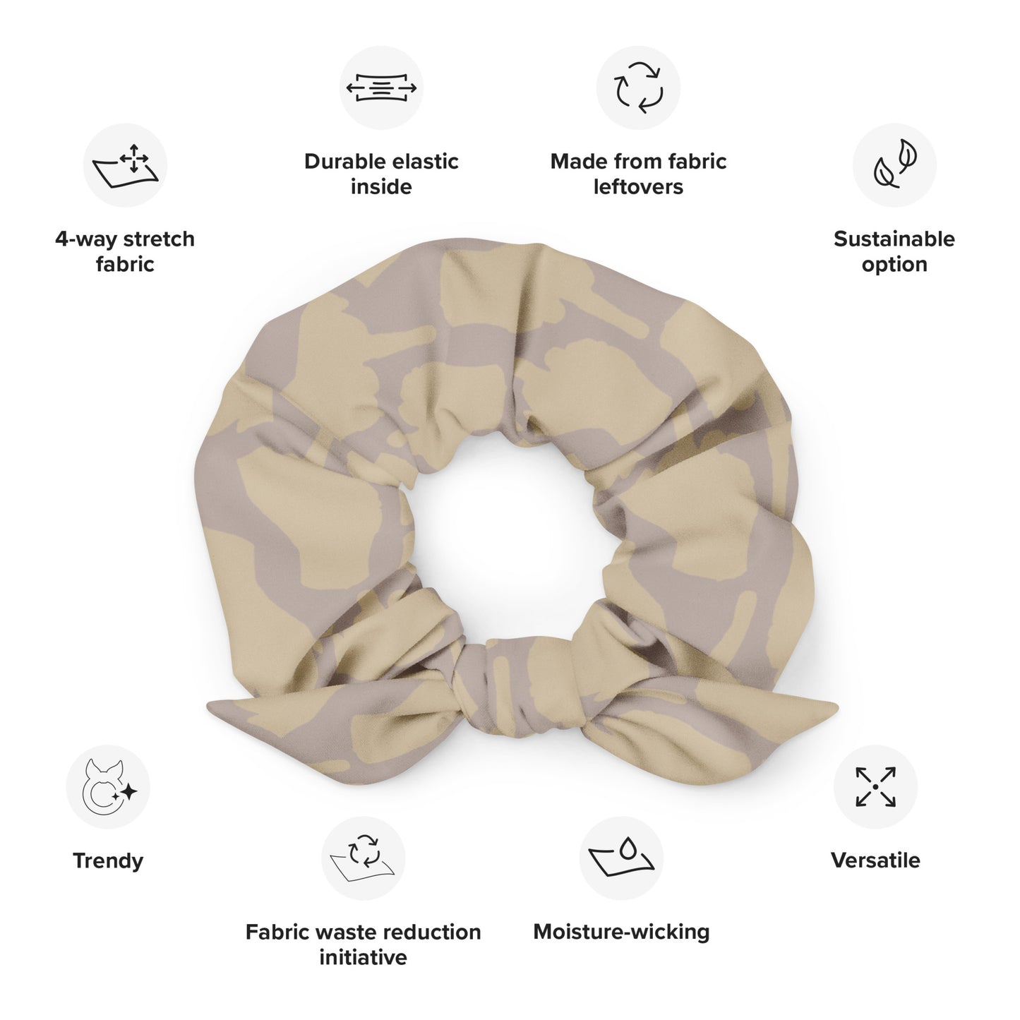 Taupe microfiber scrunchie with discreet illustrative motif — sustainable style with a quiet rebellious edge.