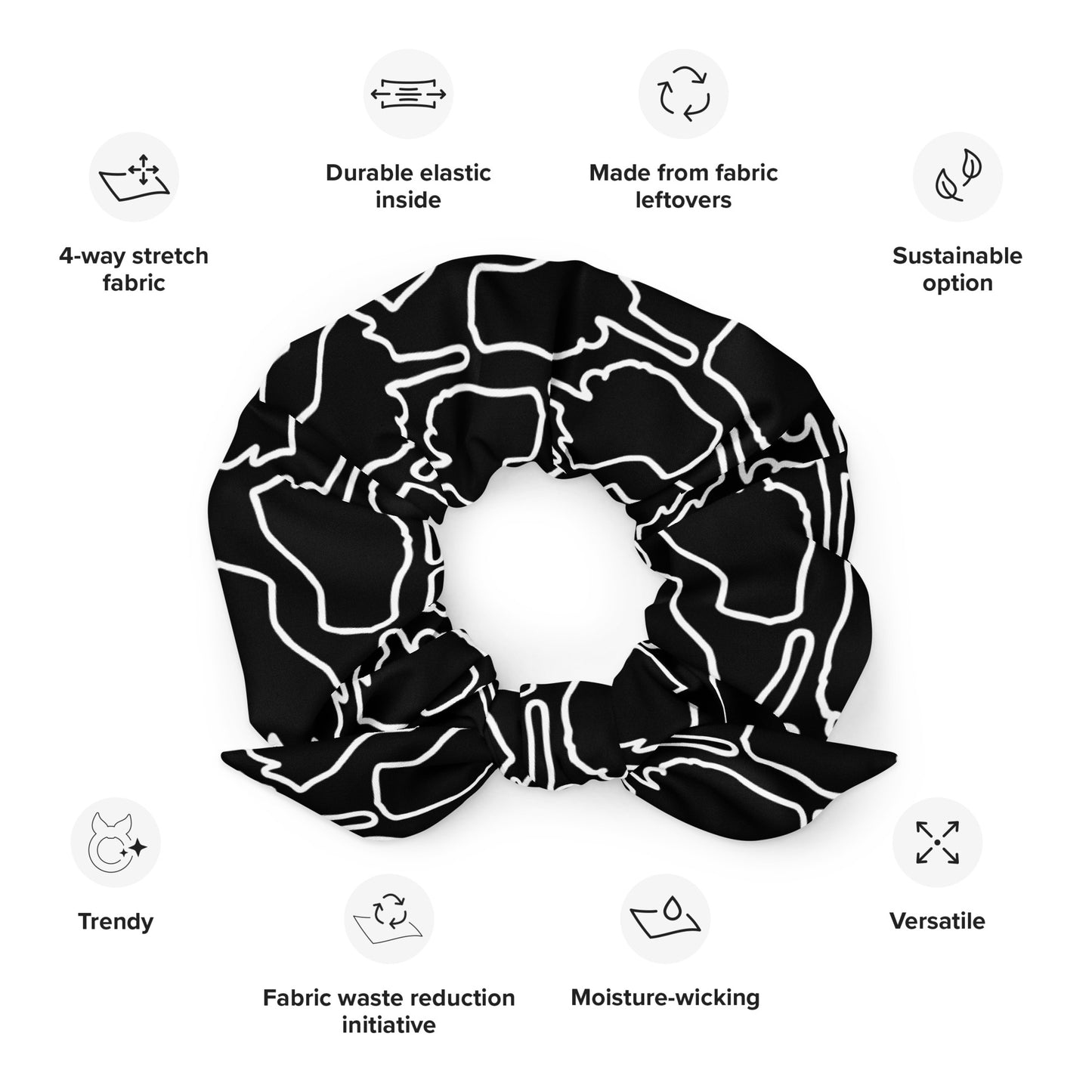 White-on-black One Finger Wave scrunchie made with eco-conscious materials — expressive yet understated design detail.