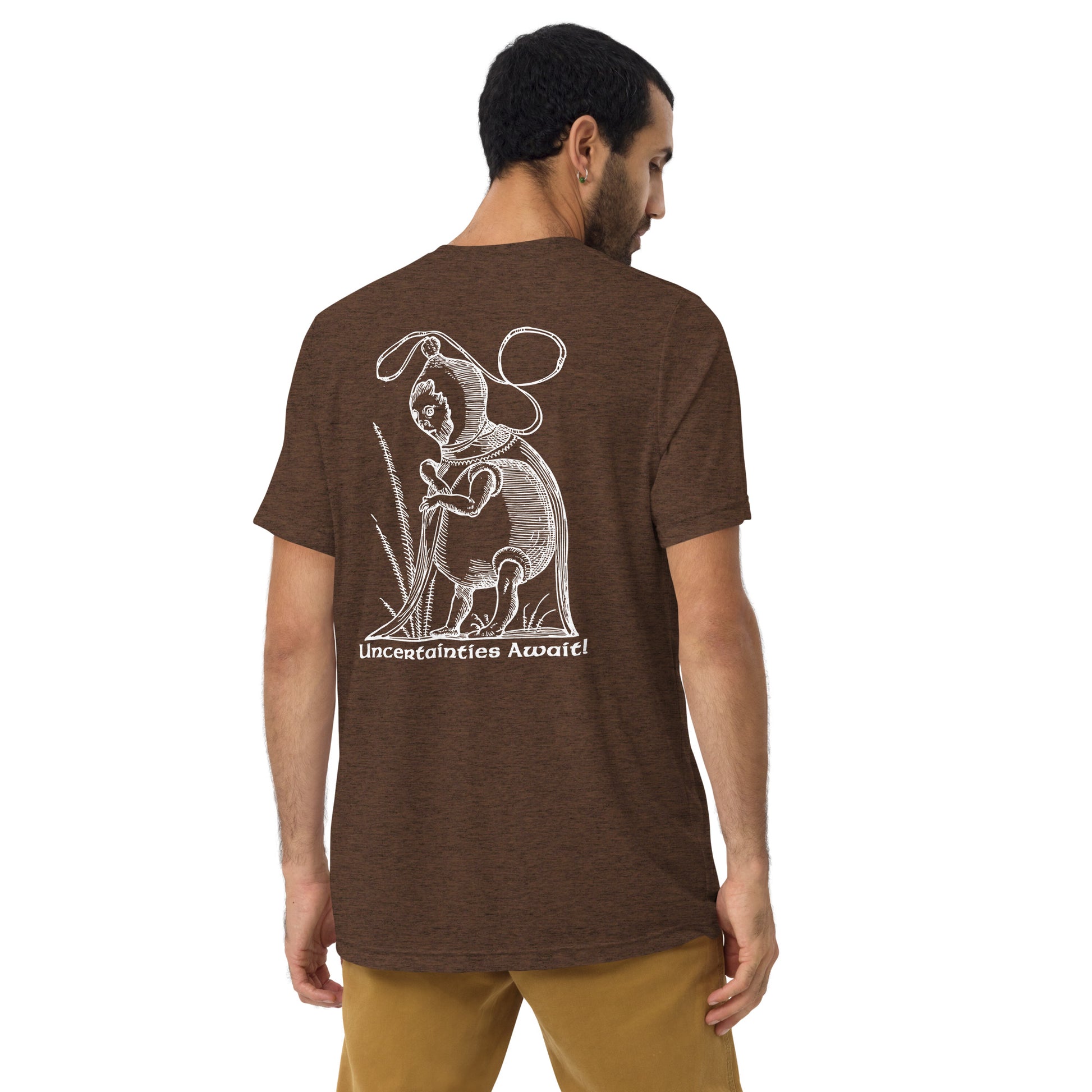 Model faces away wearing brown Pantagruel’s Dreams tee with a solemn Renaissance woodcut print.