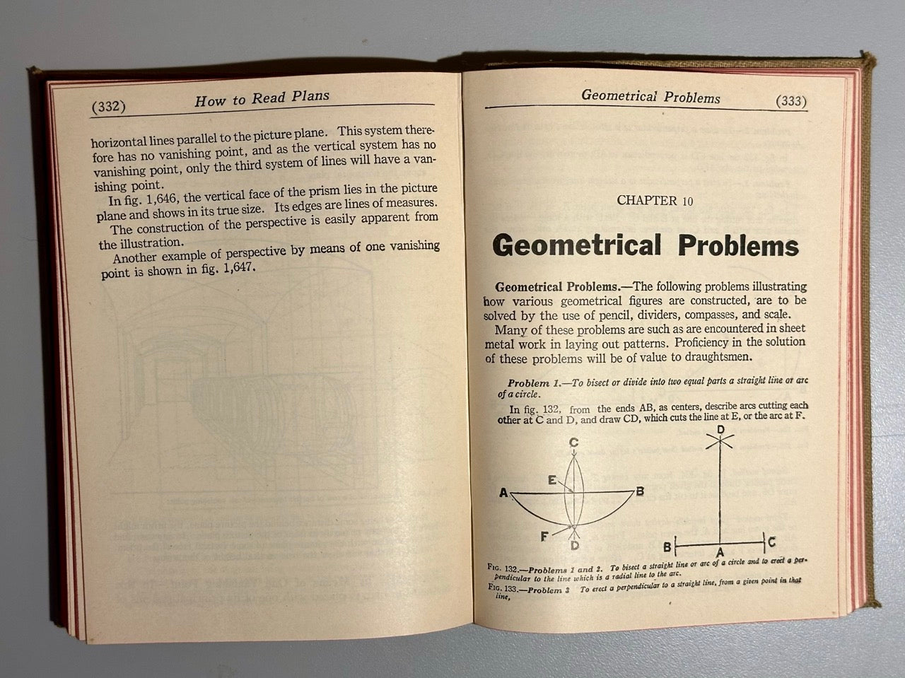Open book showing pages about 'How to Read Plans' and 'Geometrical Problems' on a gray background