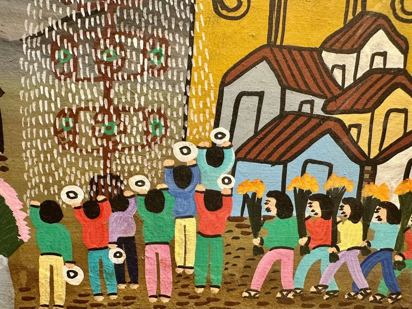 Artistic depiction of people celebrating with raised hats in front of buildings