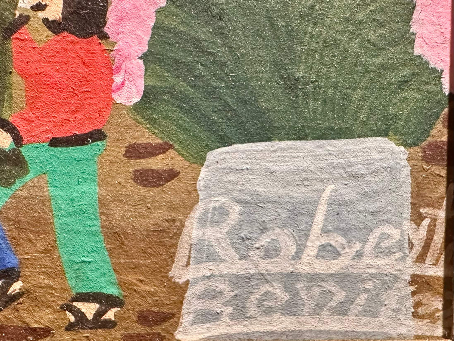 Painting with a signature in the bottom right corner on a textured background