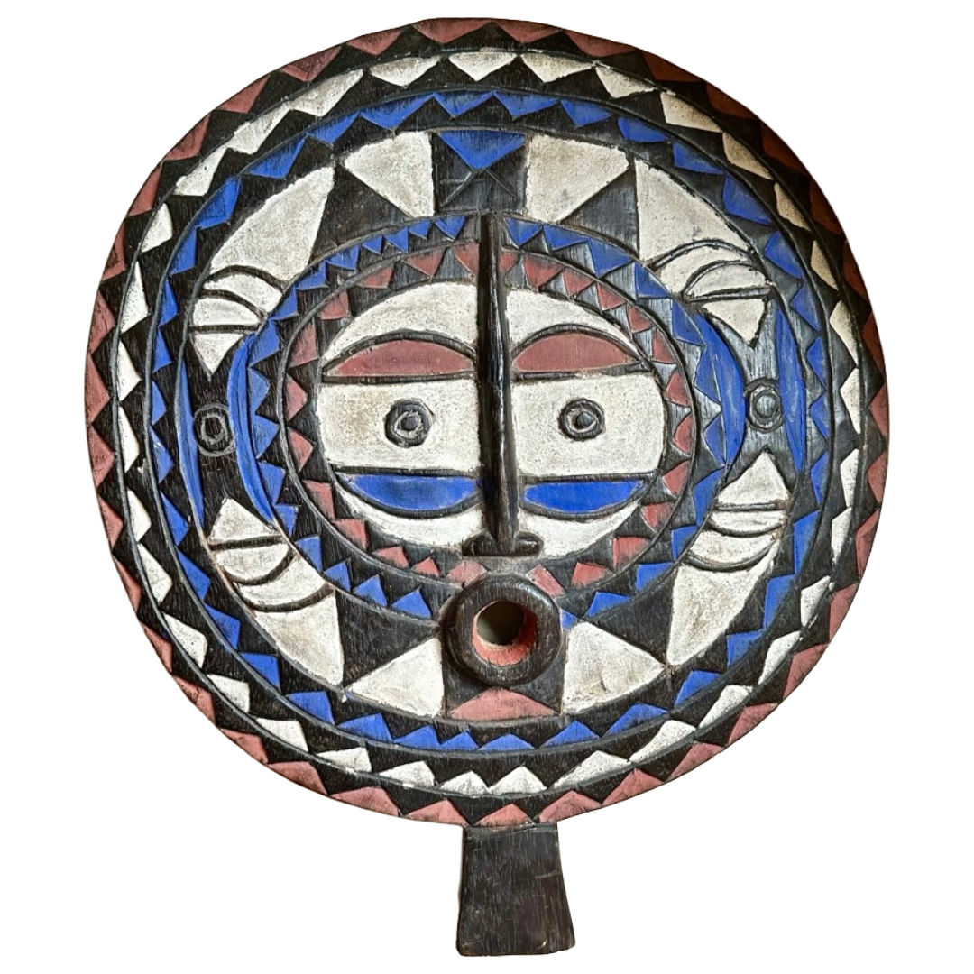 Decorative mask with geometric patterns on a white background