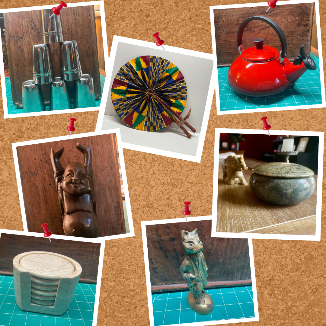 Collage of various small items on a cork board with push pins.