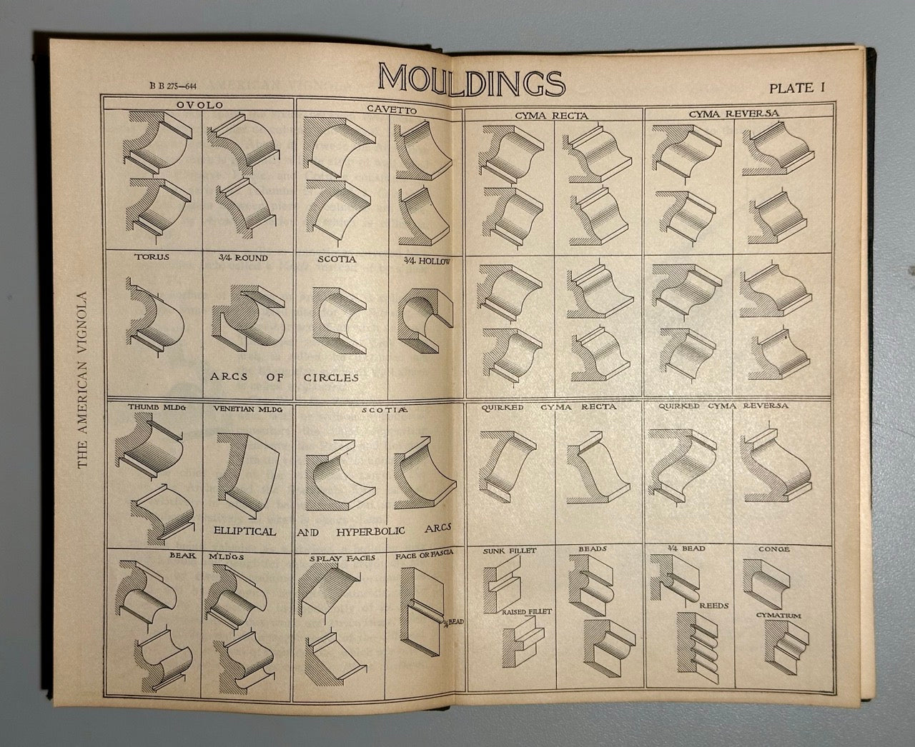 Open book showing a page titled 'Mouldings' with illustrations of architectural mouldings.